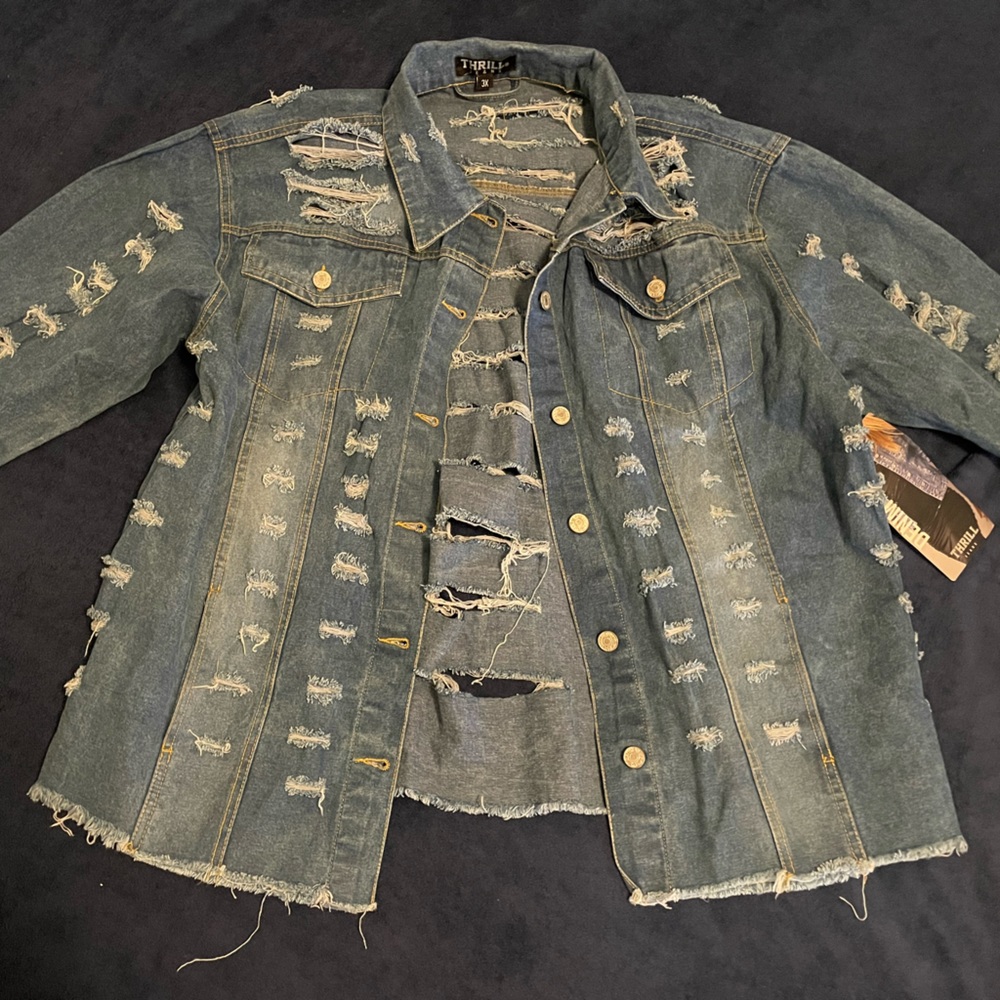 Brand new Jean jacket, never worn tags still on.